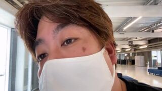 A Man Watches an Airplane at Narita Airport.